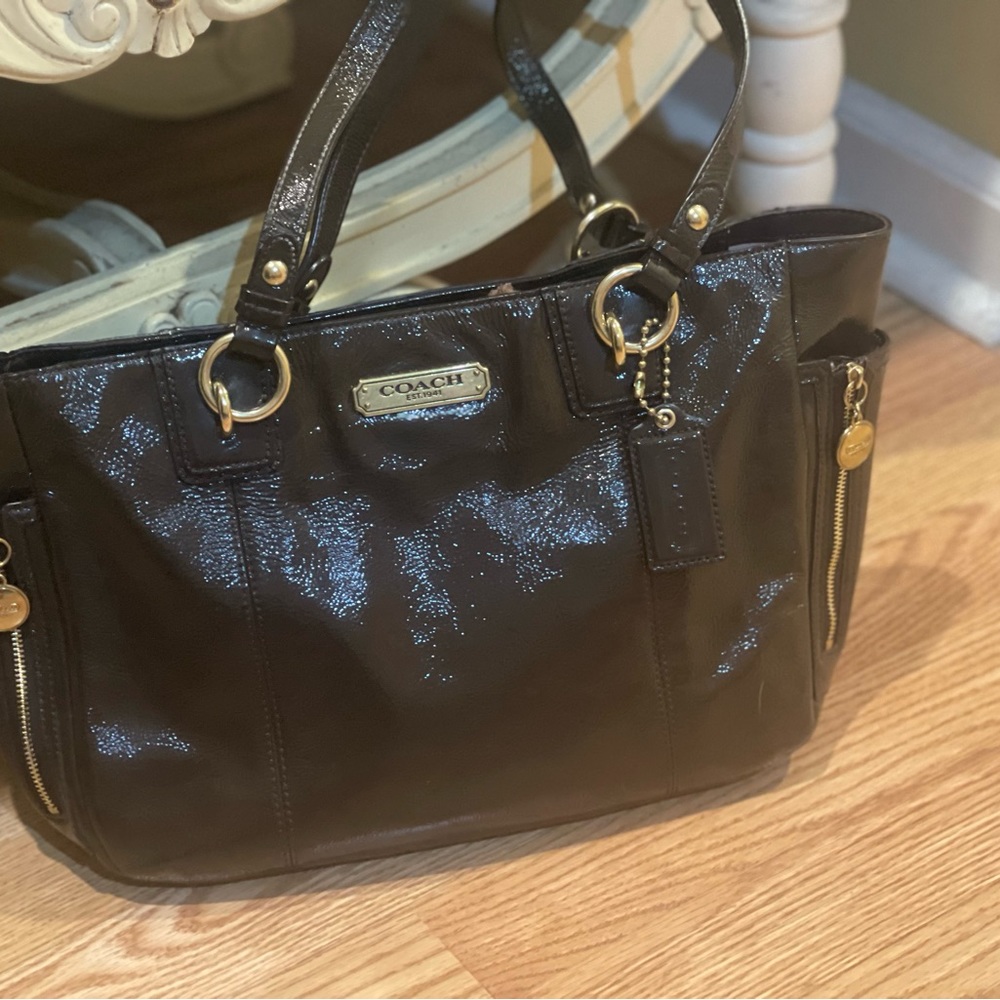 Coach deep chocolate brown patent leather tote with pink lining